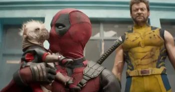 Deadpool kisses small dog, Wolverine disgusted